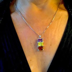 Silver necklace with pendant.